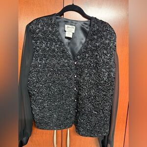 Textured Black top with Rhinestone buttons and with Sheer Sleeves